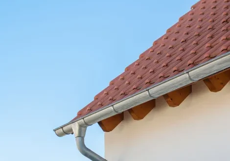 A close up of the gutter on a house